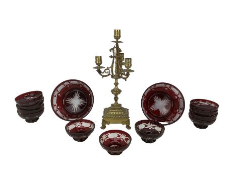20th century gilt brass four branch candelabra, H42cm together with a ruby overlay glass dessert set, comprising two serving 