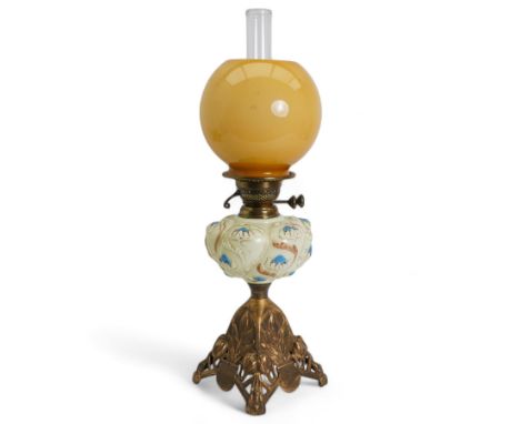 Art Nouveau oil lamp, with floral stylized moulded reservoir and similar style pierced metal base, H61cm