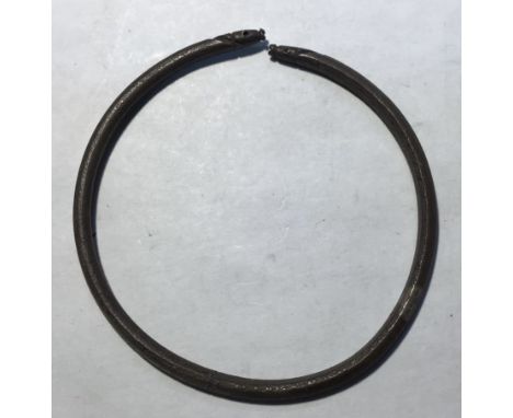 Roman Silver Bangle with&nbsp;Fish Head terminals.

Approximately 59mm overall diameter, 11.97g.
