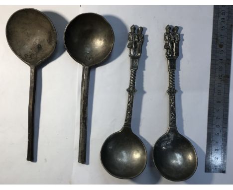Pewter Spoons, two matching with stylised figures of a King and Queen to the top. The other spoons have stamps to their bowls