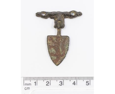 Medieval Heraldic Mount.&nbsp; Circa, 13th - 14th century AD. Copper-alloy. H23.9mm. W17.31mm. 10.12g (including hanger). A s
