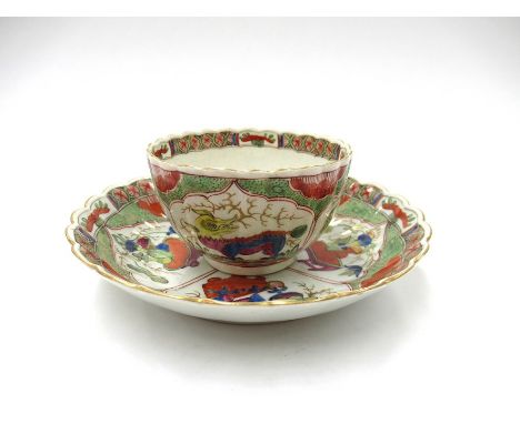 A First Period  Worcester "Bishop Summer" pattern tea bowl and saucer 