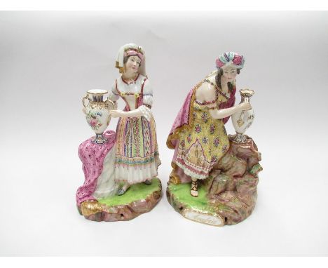 A pair of mid-19th Century Minton figures of Arabia and Persia, both modelled as ladies holding a vase on a rock or cloth cov