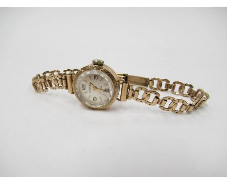 A Sekonda 9ct gold manual wind lady's bracelet watch with 17 jewel movement, horseshoe design bracelet, 12.9g