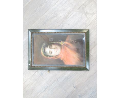 E. PIZZELLA: A framed and glazed pastel portrait of lady in red cloak, framed and glazed. 29cm x 50cm.