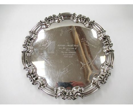 A William Hutton &amp; Sons Ltd silver salver, shaped edge, on three scroll feet, engraved personalisation, 26cm diameter, Lo