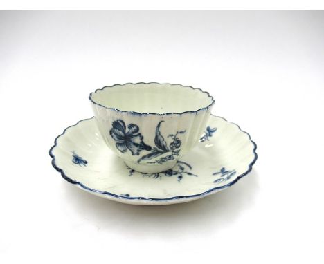 A First Period Worcester blue and white "Cornflower" pattern tea bowl and saucer 