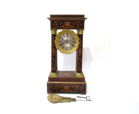 A 19th Century rosewood and satin inlaid French portico mantel clock, silvered Roman dial with engine turned mask and gilt br