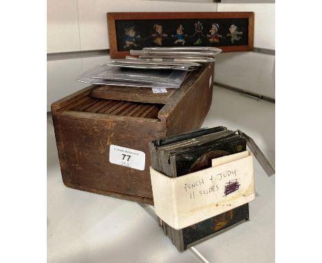 A Quantity of 19thC Magic Lantern Slides, including Punch and Judy (11), a wooden box containing twelve children's cartoon an