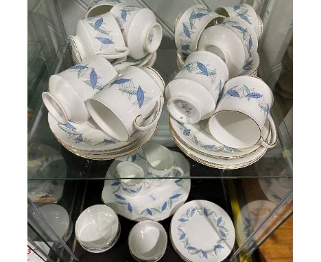 A Royal Standard 'Trend' pattern Part Tea and Coffee Service, comprising six Tea Cups, four Coffee Cans, eleven Saucers, six 