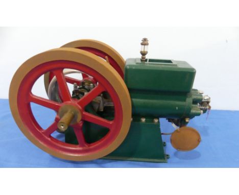 A model horizontal open crank internal combustion Stationary Engine, with twin 10¼in (26cm) diameter flywheels, finished in g