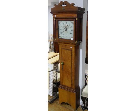 An antique oak Longcase Clock, signed Jn Tibbott, Newtown, the 30-hour movement striking on a bell, the 12in (30.5cm) painted