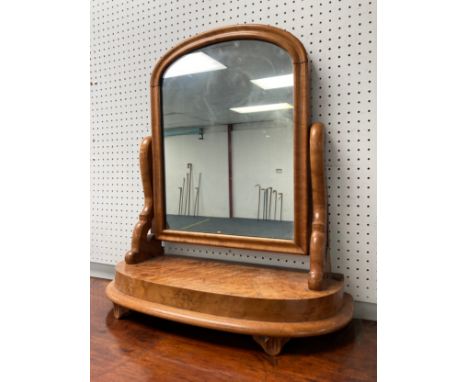 A Victorian burr maple Dressing-table Swing Mirror,&nbsp;raised on moulded feet,&nbsp;one foot missing,&nbsp;21in (52cm) wide