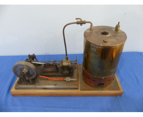 A Mill Stationary Steam Engine with Boiler, lacks chimney, 21in x 12½in high (53.5cm x 32cm) boiler has been fired but there 