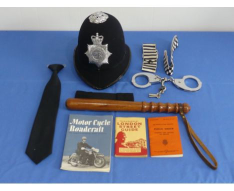 Police Interest; A c.1960's set of police Handcuffs, with keys, marked 'Met Police' 'HIATTS 1960' together with a wooden trun