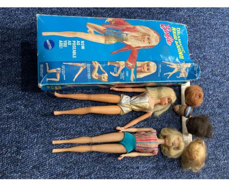Barbie; An early blond haired Doll, marked on reverse '© 1958 Mattel. Inc. U.S. Patented.....Made in Japan', also with holes 