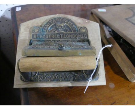 An antique 'Sanitary Paper Co' brass Toilet Roll dispenser, together with a vintage G. H. Mumm &amp; Co musical Decanter, a M