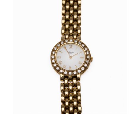 Chopard, 18 kt. gouden polshorloge. Model 10/6206, quartz. Met witte wijzerplaat met Romeinse cijfers. De lunette bezet met b