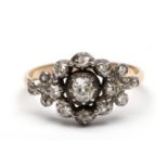 18 kt. Goud met zilveren ring.
