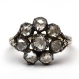 14 kt. Goud met zilveren ring.