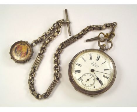 WATCH & CHAIN.A Victorian silver open faced pocket watch, with Victorian silver watch chain attached with compass fob.