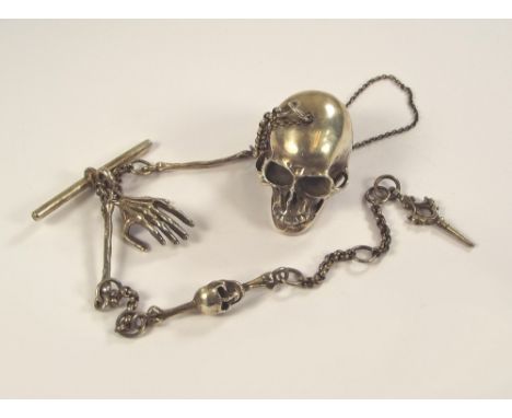 WATCH CHAIN.A Victorian style silver gothic watch chain & fob, the skull fob with articulated jaw, the chain with skeletal ha