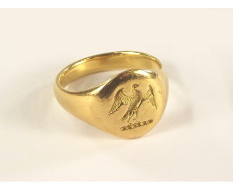 SIGNET RING. An Edwardian intaglio signet ring with spread eagle. Inscribed & dated. Approx. 8.6g.