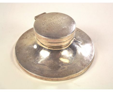 SUFFRAGETTE INKWELL. An Edwardian silver capstan inkwell by William Aitken, the lid engraved 'St. Moritz Suffragette 1910.' B