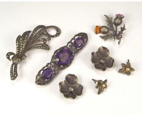 MARCASITE ETC. A silver, marcasite & amethyst bar brooch, 5.6cm, a Scottish silver thistle brooch & other marcasite set piece