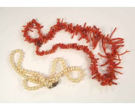 CORAL & PEARLS. A stick coral necklace & a single strand of cultured pearls.