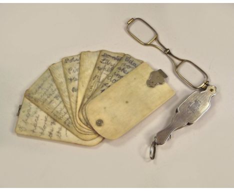 LORGNETTES ETC. A pair of lorgnettes, in engine turned white metal case & a 19th century aide memoire. 