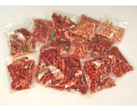 CORAL.A large collection of stick coral, carved coral, beads, carved hands & pieces for jewellery setting or threading.