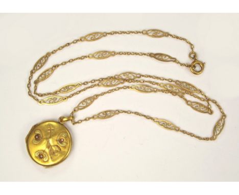 LOCKET & CHAIN. A yellow metal mistletoe locket with half pearls, hung on a fancy link chain.