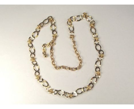 GOLD NECKLACE. A modern 9ct. gold necklace with extension chain. 12.3g.