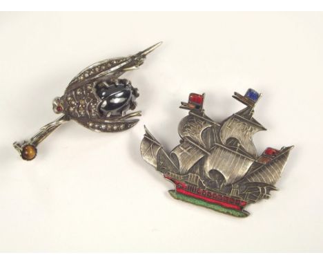 SILVER PINS.A silver & enamel 1950's galleon pin by Stratton & a silver bug pin set with tiger's eye & haematite.