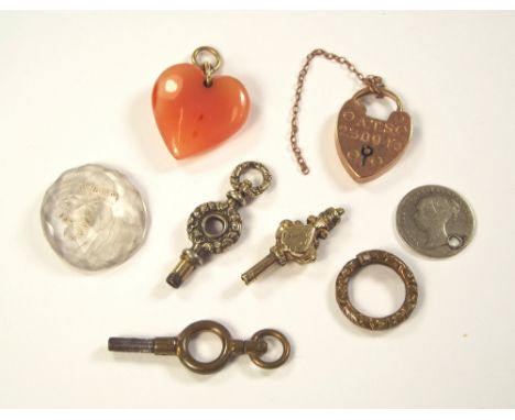 WATCH KEYS ETC. Three watch keys (one without loop), a 9ct. gold padlock clasp engraved A.T.S. 230943, M.R. Harter, a glass i
