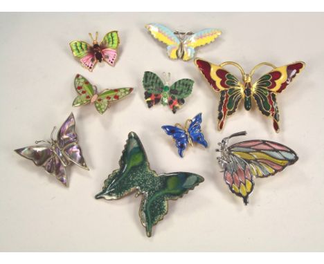 BUTTERFLY PINS.Nine various butterfly pins including silver & enamel, plique-a jour, abalone, paste etc. Largest 6.2cm.
