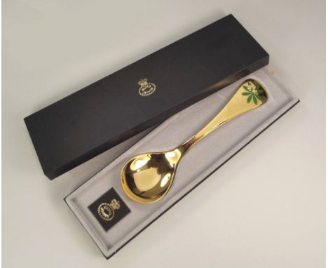 GEORG JENSEN. A Georg Jensen 1975 silver gilt & enamelled Corn Marigold year spoon, cased. (No leaflet)