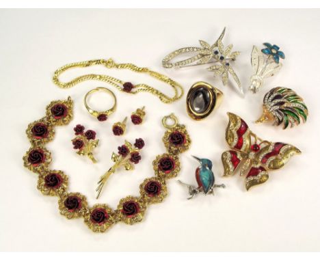 COSTUME JEWELLERY. Including a rose suite in gilt metal, enamel etc.