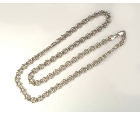SILVER CHAIN. A modern fancy link silver chain. Length 60cm.