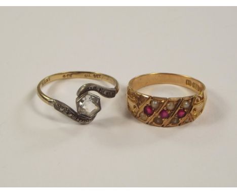 GOLD RINGS. A Victorian 15ct. gold ruby & half pearl ring & a 9ct. gold & silver dress ring.