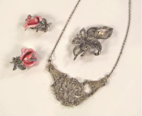 MARCASITE.A pair of 1950's silver, cold painted enamel & marcasite ear clips, a marcasite lily brooch & a 1940's marcasite ne