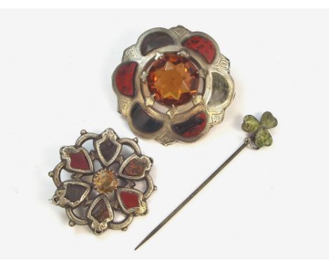 HARDSTONE BROOCHES ETC. Two hardstone set brooches, largest 4.5cm. & a shamrock stick pin set with Connemara marble.