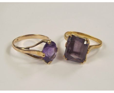 DRESS RINGS. A 14k amethyst set dress ring & an oriental yellow metal ring, set a rectangular stone.