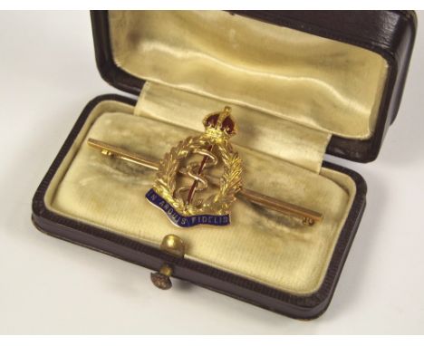 SWEETHEART PIN. A 9ct. gold & enamelled Royal Army Medical Corps sweetheart pin, cased. Length 5cm.