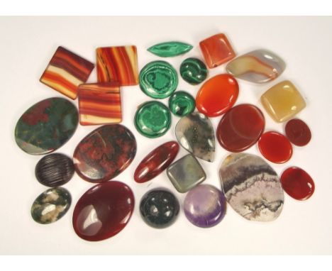 POLISHED HARDSTONES.Polished hardstones for jewellery setting including agates, malachite, amethyst etc. Largest grey agate 4