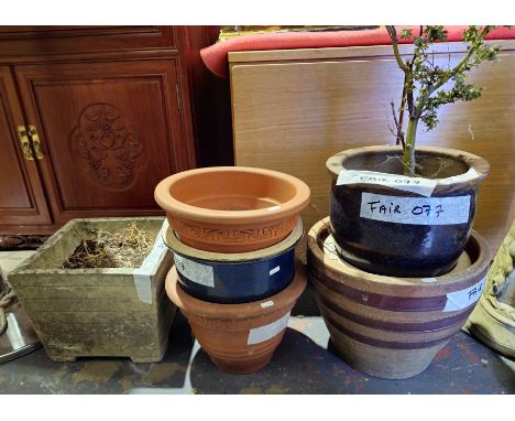 Seven assorted garden plant pots including terracotta, glazed and cast concrete (7)