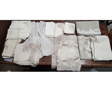 Two boxes of assorted vinatge textiles&nbsp;including linen tablecloths, napkins and a Thomas Goode&nbsp; quilted bedspread (