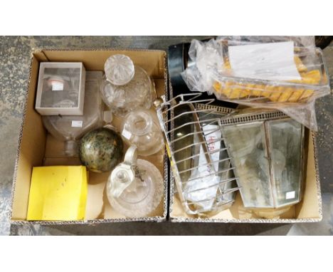 Two boxes of assorted items including a pair of metal and bevelled glass wall lights, a cut glass wine jug and other items (2