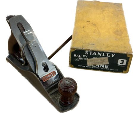 Vintage Stanley plane in original box and a vintage tape measure 